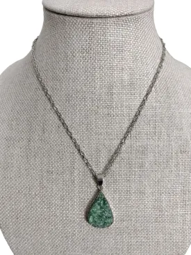 Raw Kyanite set in sterling silver pendant on sterling silver chain